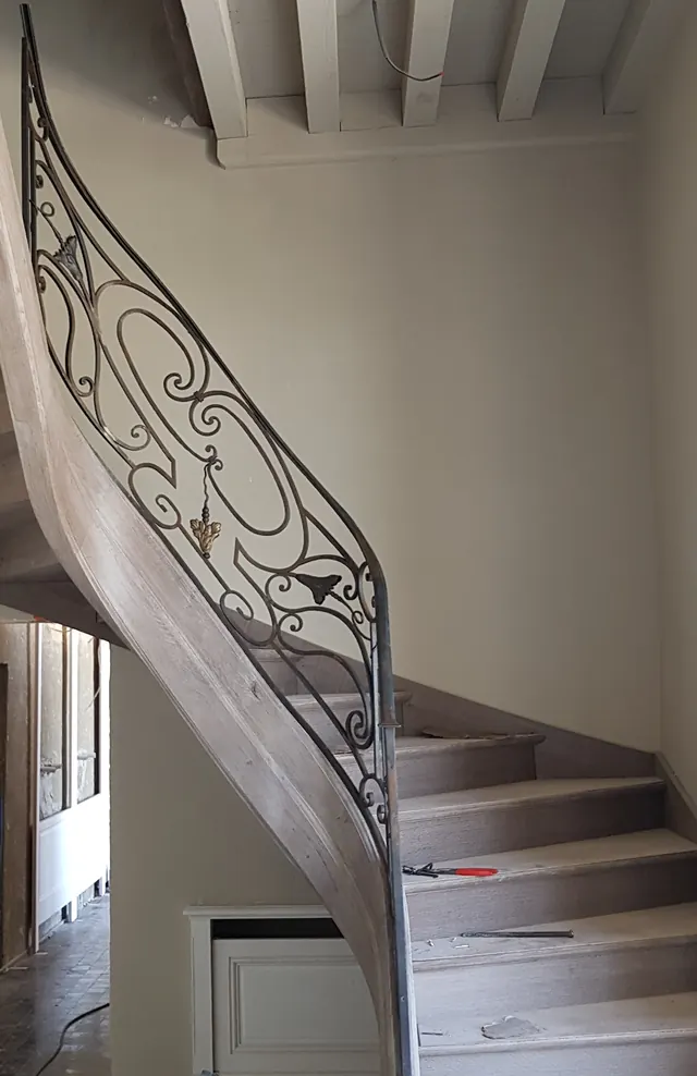 Départ de rampe en fer forgé, château Calon Ségur